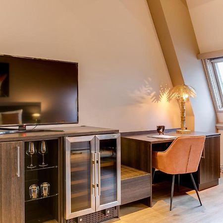 Brasss Hotel Suites Haarlem Exterior foto A room at the hotel