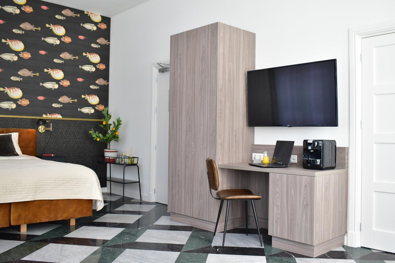 Brasss Hotel Suites Haarlem Exterior foto A room at the hotel