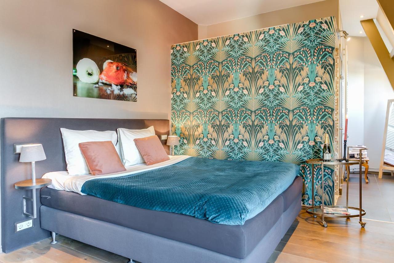 Brasss Hotel Suites Haarlem Exterior foto A room at the hotel