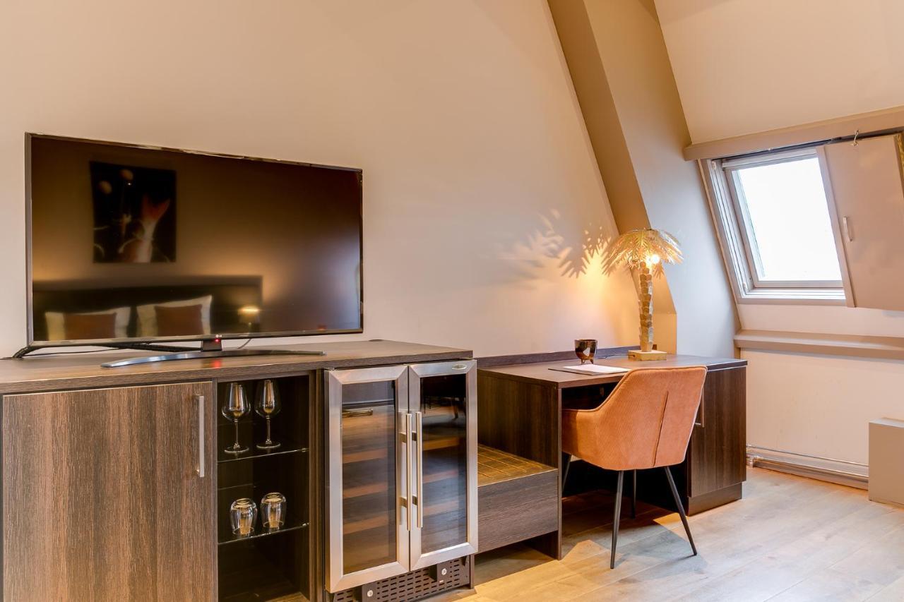 Brasss Hotel Suites Haarlem Exterior foto A room at the hotel