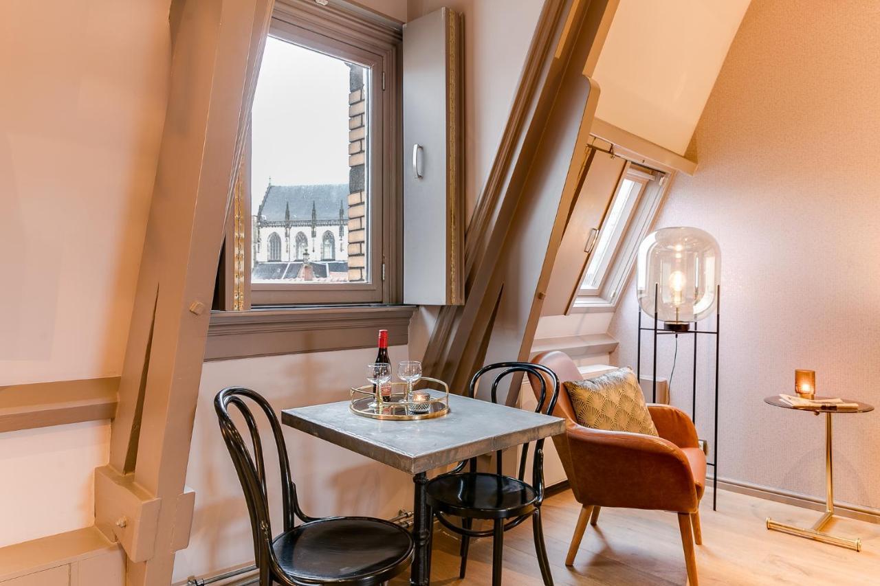 Brasss Hotel Suites Haarlem Exterior foto A typical room at the hotel